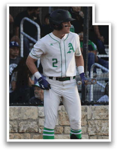 A baseball player in a white uniform stands on the field holding a bat. AI generated content