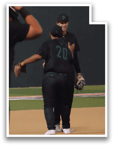 Two baseball players on a field, one wearing a green shirt and the other wearing a black shirt. AI generated content
