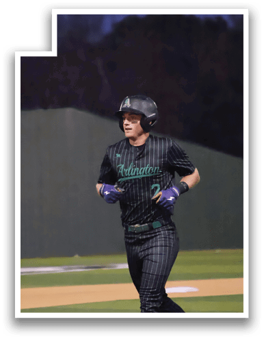 A baseball player wearing a black and green uniform is running on the field. AI generated content