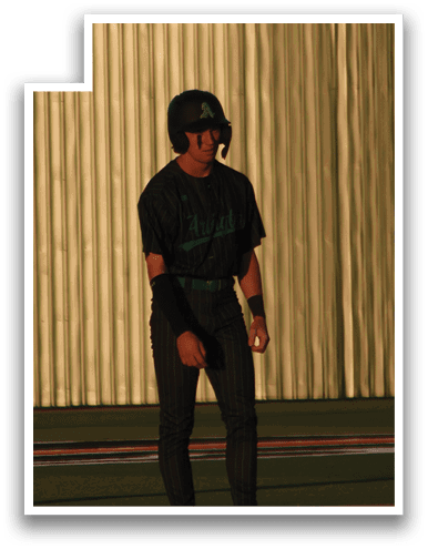 A baseball player is running towards home plate, holding a bat. AI generated content