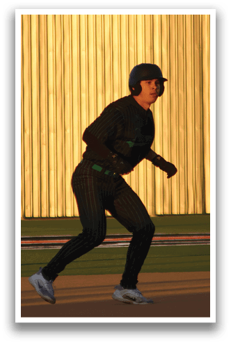 A baseball player wearing a black helmet and green shirt is running on the field. AI generated content