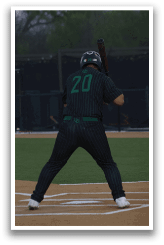 A baseball player is holding a bat and standing on a field. AI generated content
