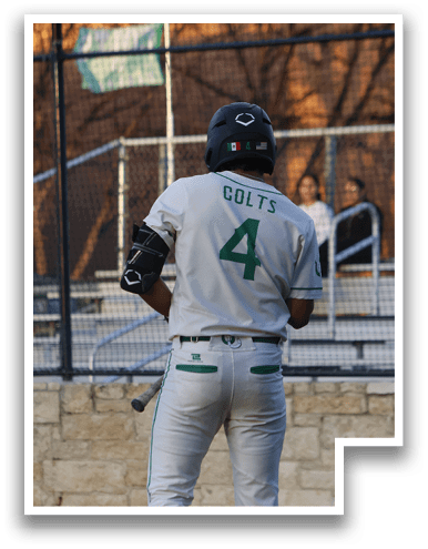 A baseball player wearing a green and white uniform with the number 4 on the back is holding a bat and getting ready to hit the ball. AI generated content