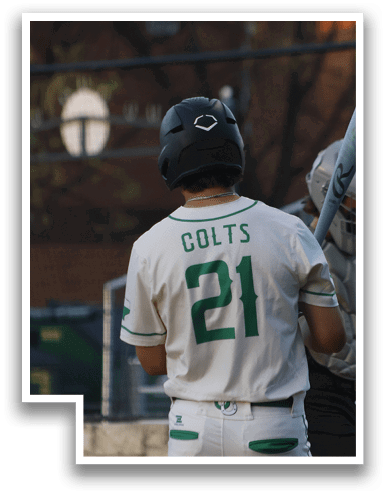 A baseball player wearing a white and green jersey with the number 12 on the back. AI generated content