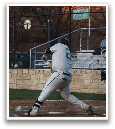 A baseball player in a white uniform is swinging a bat, attempting to hit a ball. AI generated content