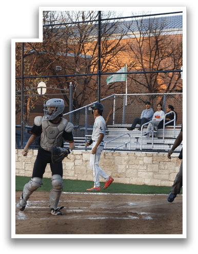 A baseball player is running towards home plate while a catcher is trying to catch the ball. AI generated content