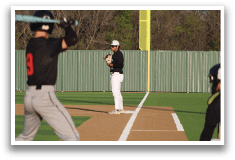 A baseball player is holding a bat, getting ready to hit the ball. AI generated content