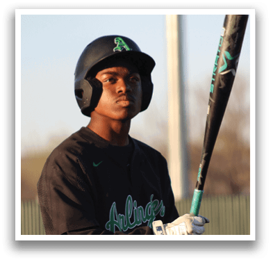 A young man wearing a black shirt and a helmet is holding a baseball bat. AI generated content