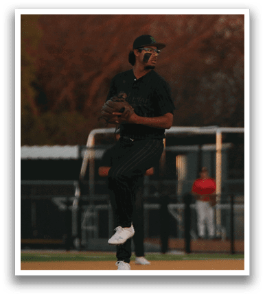 A baseball player in a green shirt and black pants is pitching a ball. AI generated content