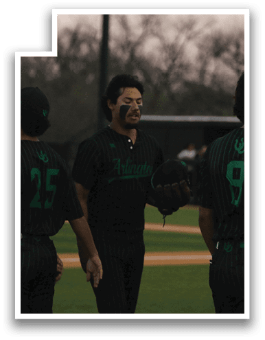 Baseball players wearing green and black uniforms standing on a field. AI generated content