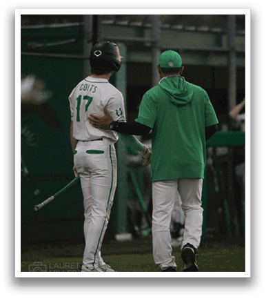Two men wearing baseball uniforms are walking on a field. AI generated content