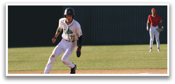 A baseball player is running towards a base, wearing a green helmet and white uniform. Another player is standing nearby, watching the action. AI generated content