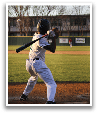 A baseball player in a white uniform is swinging a bat at a ball. AI generated content