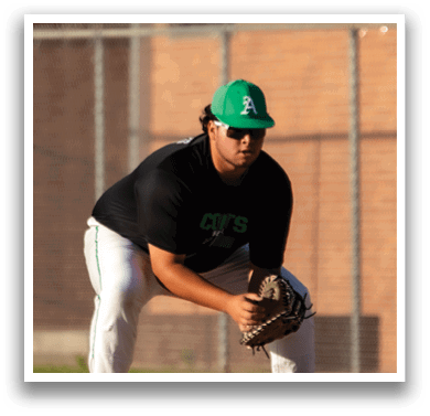 A baseball player in a green hat and black shirt is crouching on the field, holding a baseball glove. AI generated content