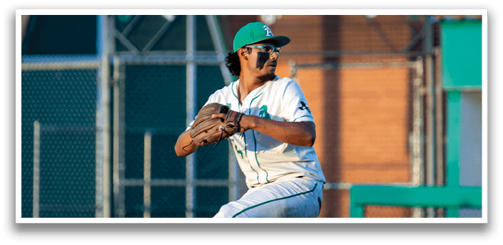 A baseball player wearing a green and white uniform is walking on the field. AI generated content