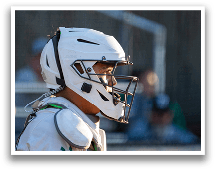 A baseball player is at bat, holding a bat and preparing to swing. AI generated content