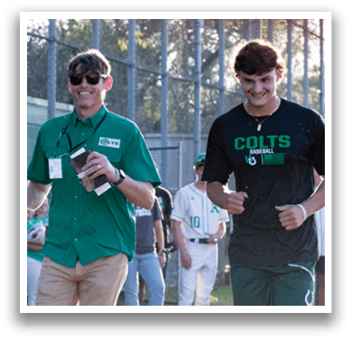 Two men are running on a field, one of them wearing a green shirt and the other wearing a black shirt. They are both smiling as they run. AI generated content