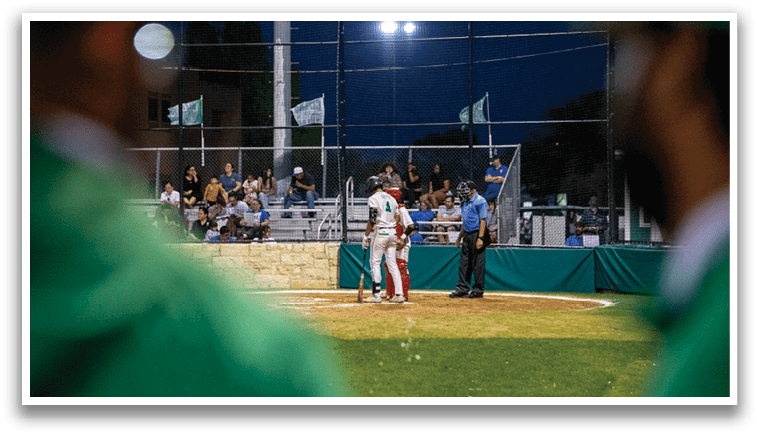 A baseball game is taking place with a batter at the plate, a catcher, and an umpire. The batter is holding a bat and preparing to swing. AI generated content