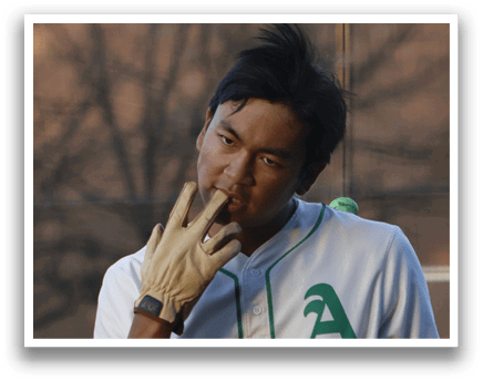 A baseball player wearing a white uniform with the number 24 on the back is seen making a hand gesture. AI generated content