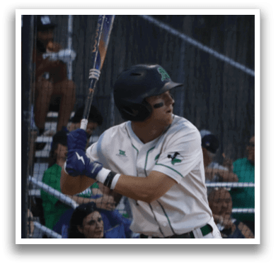 A baseball player in a white uniform is swinging a bat at a ball. AI generated content