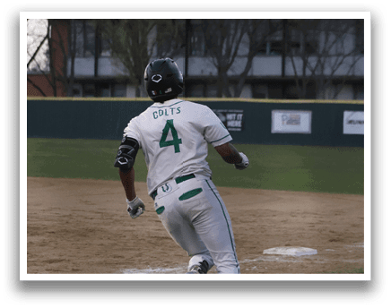 A baseball player is running towards home plate, wearing a white uniform and a green shirt. AI generated content