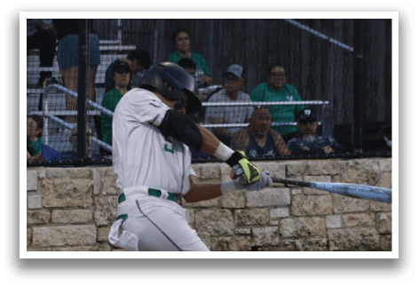 A baseball player is sliding into home plate, while a crowd of people watches. AI generated content