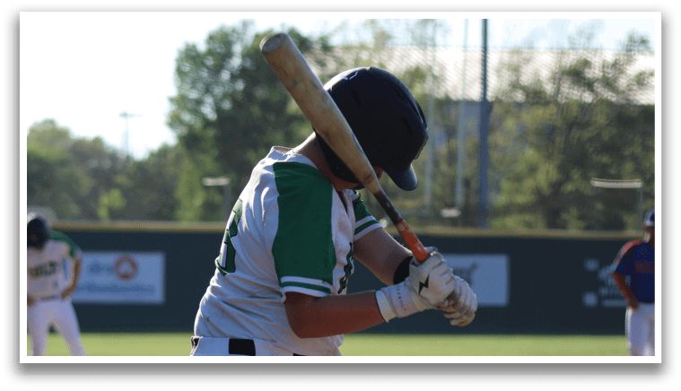 A baseball player is at home plate, holding a bat and getting ready to swing. AI generated content