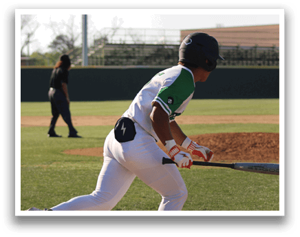 A baseball player in a white uniform is swinging a bat at a ball. AI generated content