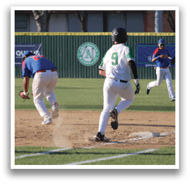 A baseball player in a blue uniform is running towards a base. AI generated content