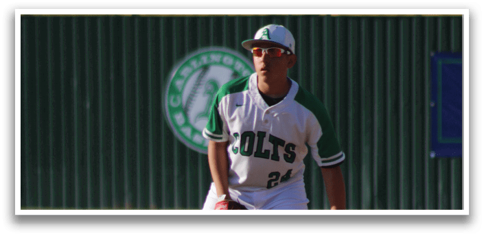 A baseball player in a green and white uniform is standing on a field, ready to catch a ball. AI generated content