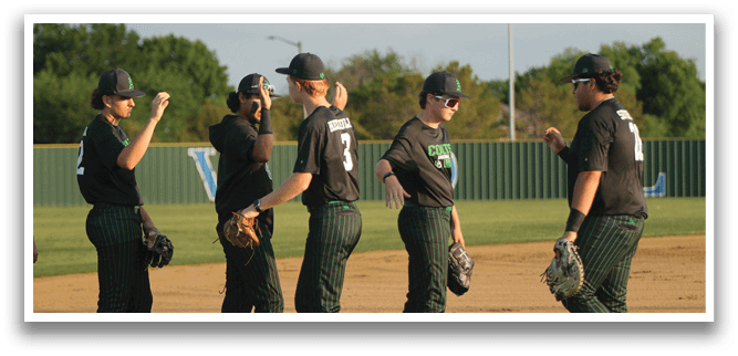 A group of baseball players wearing green and black uniforms. Description generated by AI