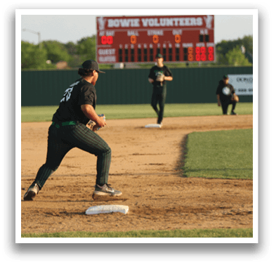 A baseball player is sliding into a base. Description generated by AI