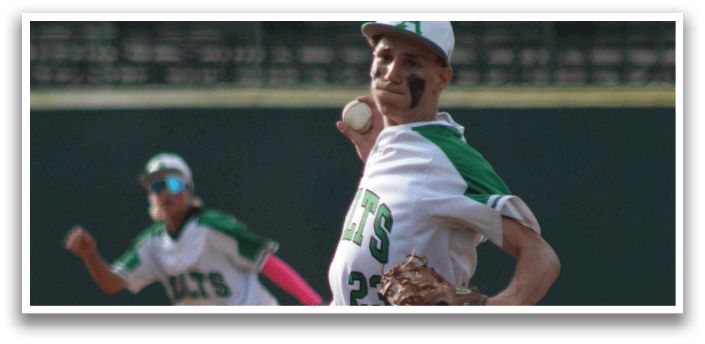 A baseball player in a white uniform is pitching a ball. Description generated by AI
