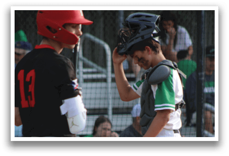 A baseball player wearing a helmet and holding a mitt. Description generated by AI