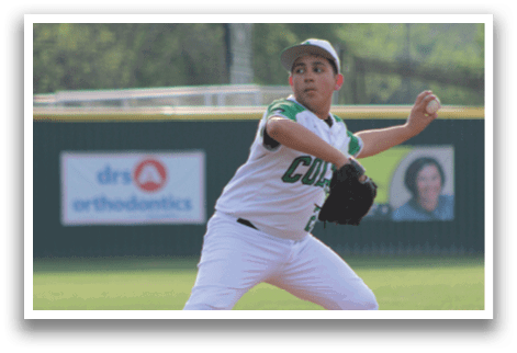A baseball player in a white uniform is throwing a ball. Description generated by AI