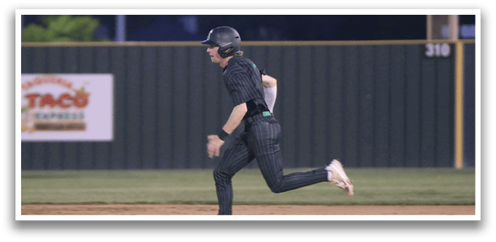 A baseball player running on the field. Description generated by AI
