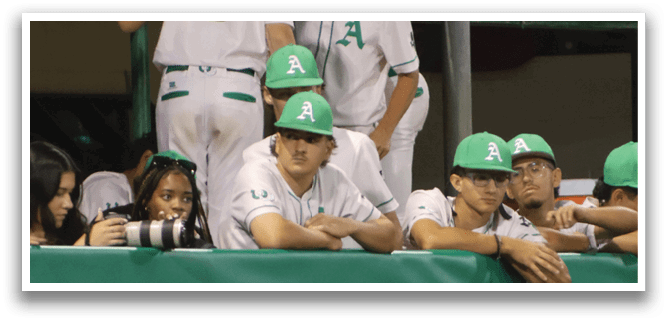 A group of people wearing green hats. Description generated by AI