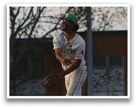A baseball player in a white uniform is throwing a ball. Description generated by AI