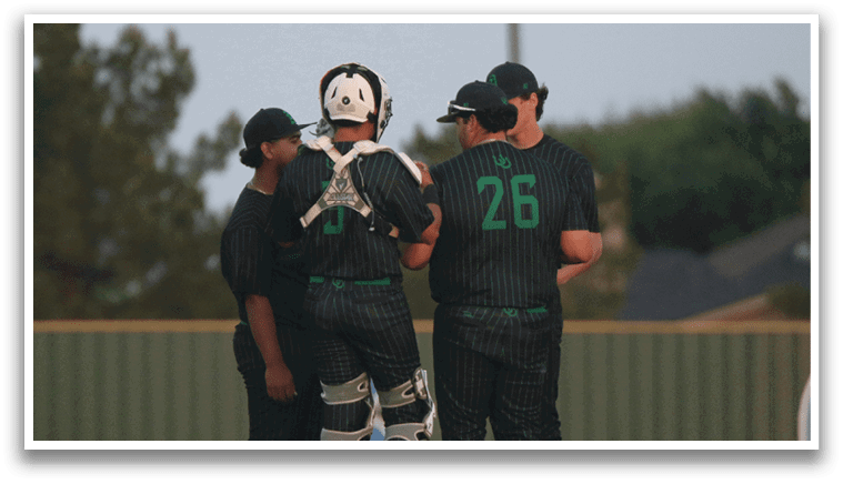 Three men wearing green and black uniforms. Description generated by AI