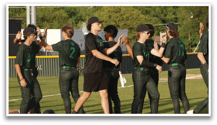 A group of people wearing green and black uniforms. Description generated by AI