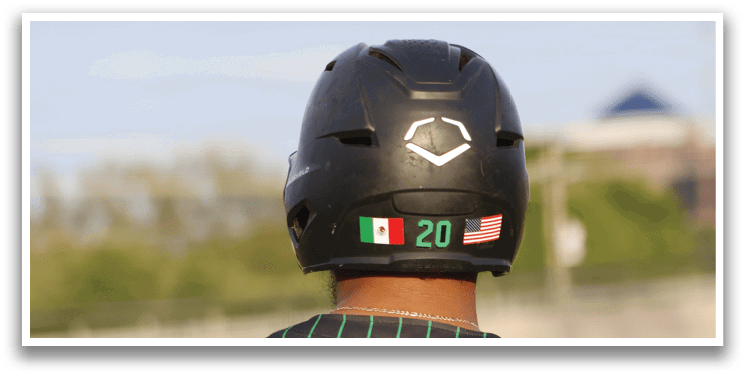 A man wearing a jersey with the number 20 on the back. Description generated by AI