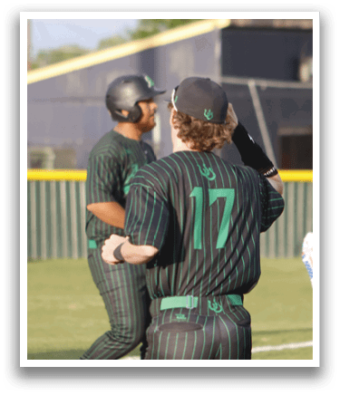 Three baseball players wearing green and black uniforms. Description generated by AI