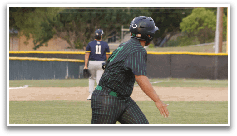 A baseball player running on the field. Description generated by AI