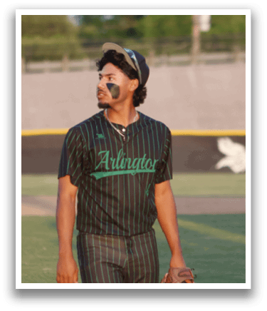 A baseball player wearing a black and green jersey. Description generated by AI