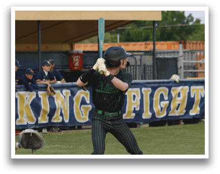A baseball player is swinging a bat at a ball. Description generated by AI