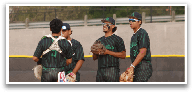 Three baseball players standing on a field. Description generated by AI