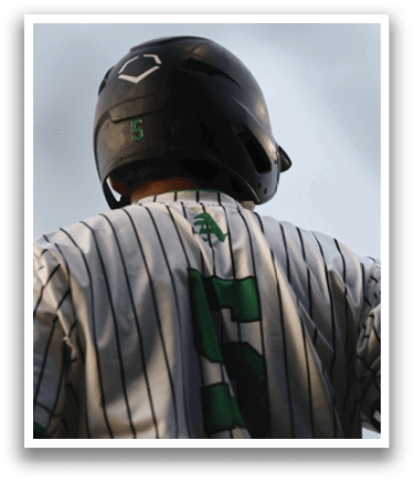 A baseball player wearing a green and white jersey. Description generated by AI