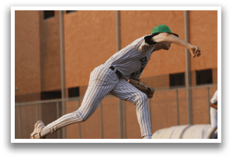 A baseball player sliding into a base. Description generated by AI