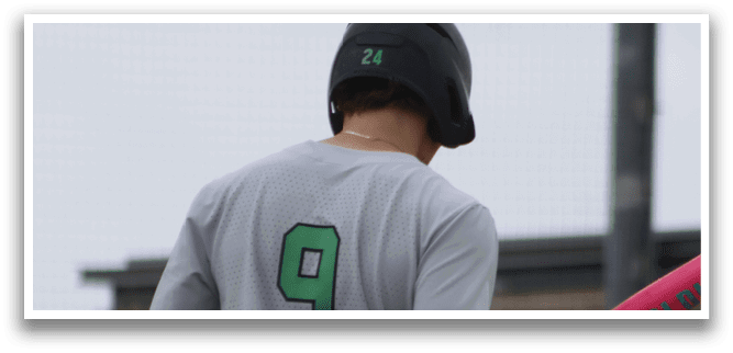 A baseball player wearing a grey jersey with the number 6 on it. Description generated by AI