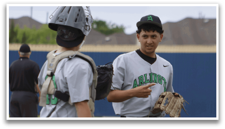 Two baseball players on a field. Description generated by AI